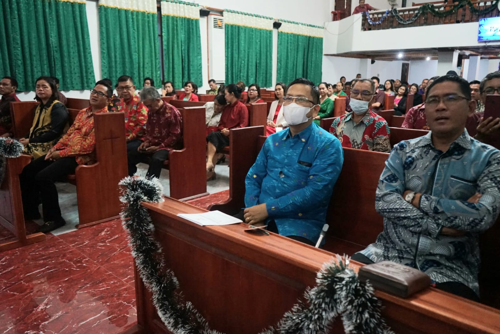 Kadis P2KB Wakili Wali Kota Palu Hadiri Ibadah Pra Perayaan Natal di Sinode Gereja Protestan Indonesia