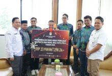 Temui Wali Kota Hadianto Ketua KPU Palu Kembalikan Sisa Hibah Dana Pilkada Rp23 Miliar ke Pemkot